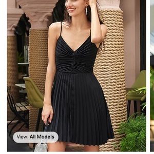 Black dress from Express with ripples in XS.  Brand New with  tag.